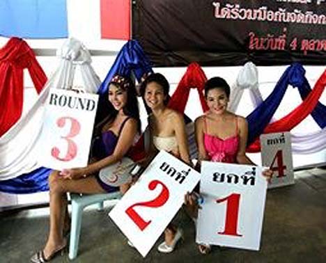 Incarcerated ladyboys get in on the Prison Fight action too as ring girls.